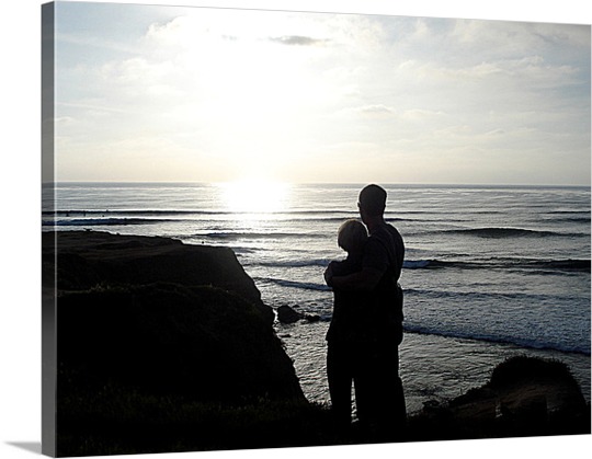 Canvas Print of Couple during Sunrise on Beach