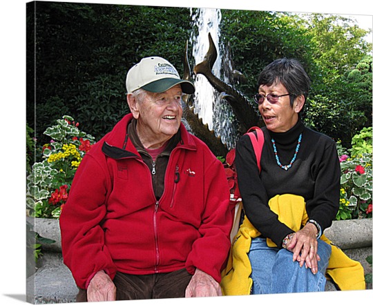 Print on Canvas of Older Couple in Garden
