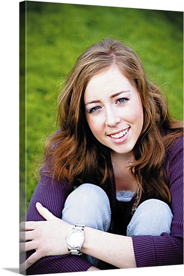 Photo of Woman Hugging Knees on Canvas