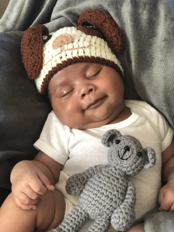a custom oil painting of a child sleeping with teddy bear