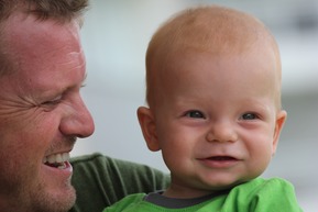 an oil painting of father and his boy