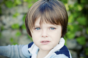 as custom oil portrait of a boy with green blue eyes