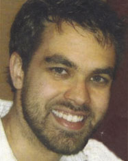 memorial portrait in oil of a smiling young guy