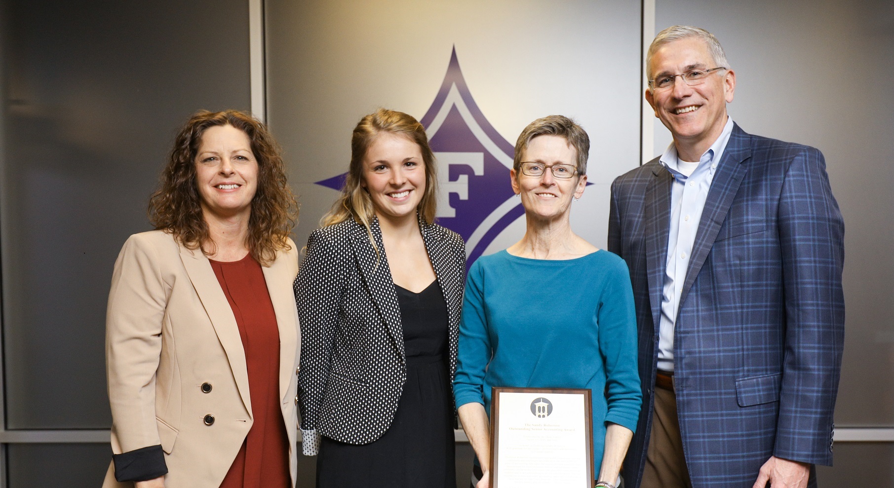 Sandy Roberson is honored by student and family - Furman News