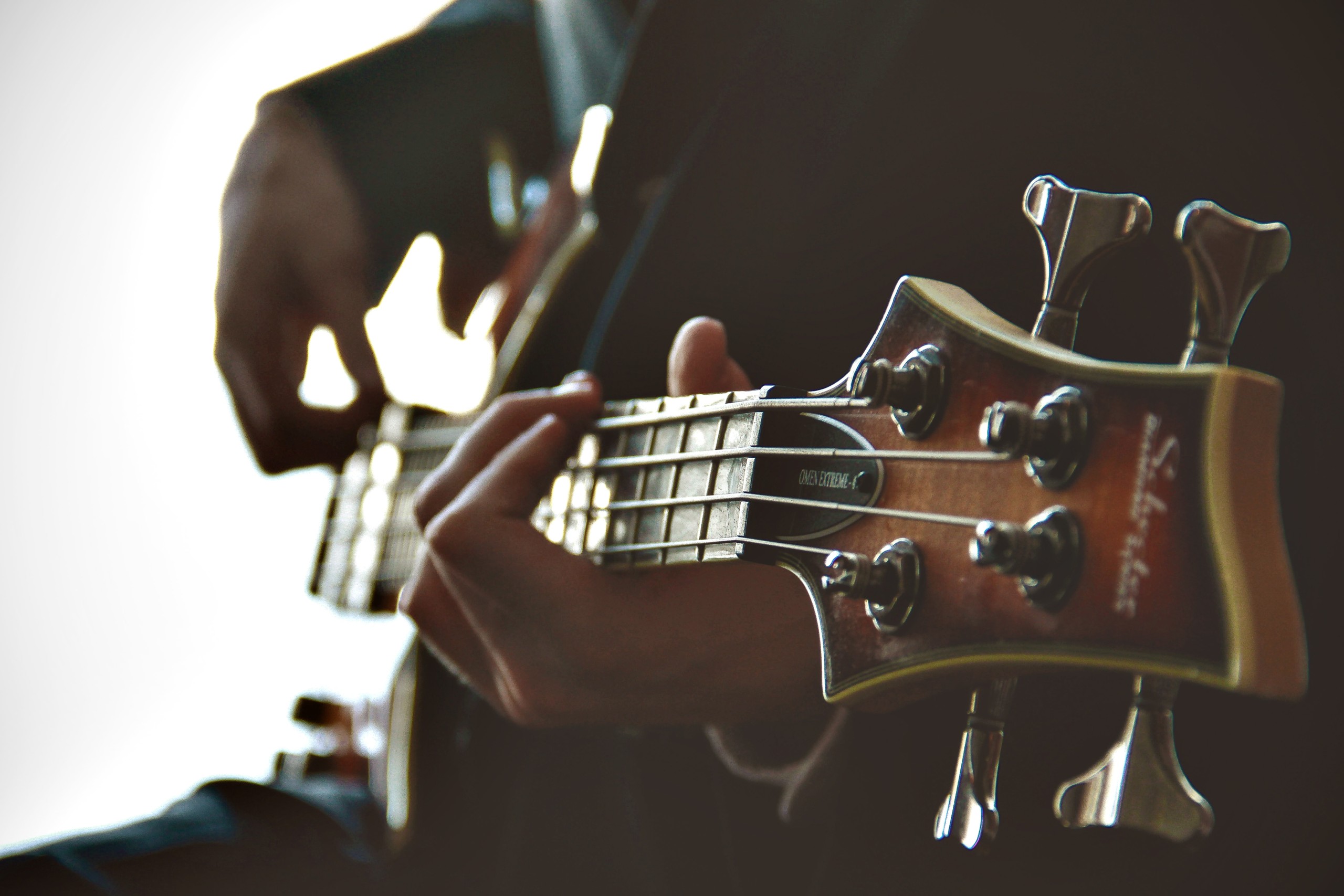 Person playing the guitar as music tharapy.
