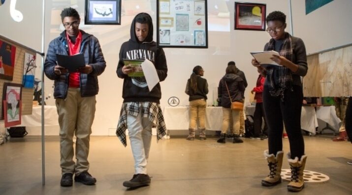 3 students standing
