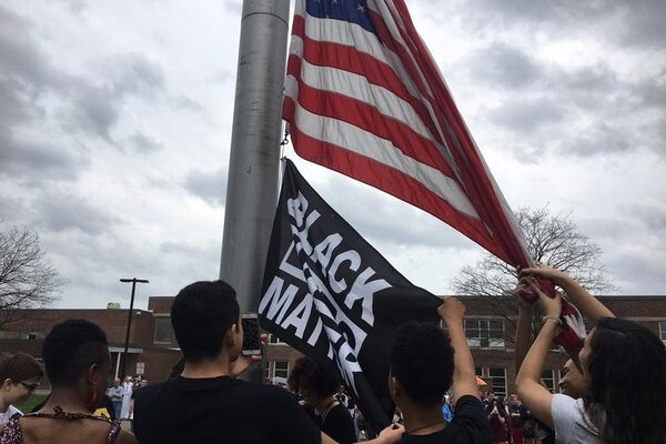 students raise BLM flag at school