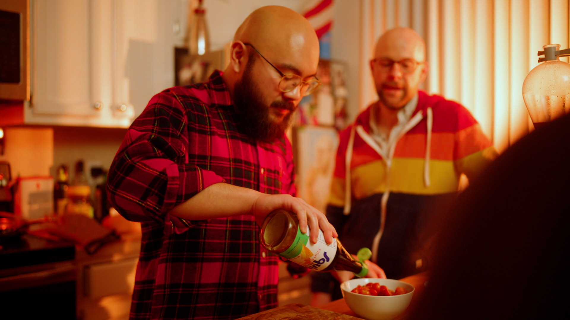 Filipino man with beard serves food