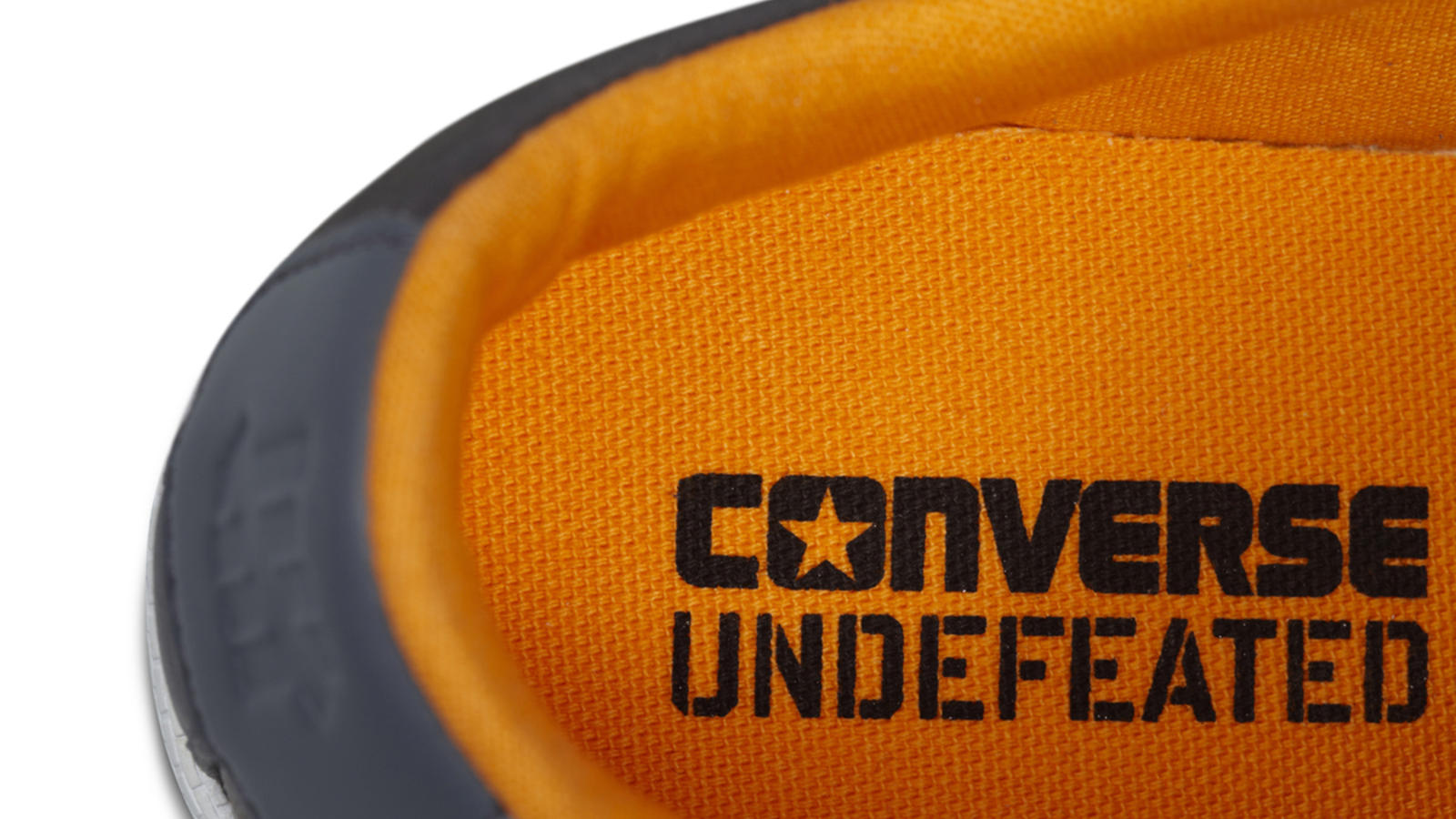 white leather converse foot locker