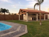 Casa en renta en Puerta Real, Corregidora, Querétaro con jardín y alberca Casa en renta en Puerta Real, Corregidora, Querétaro con jardín y alberca
