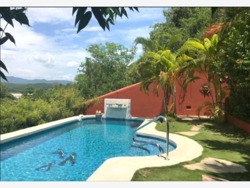 Casa en venta en Residencial Conejos, Santa María Huatulco — foto 1 de 37