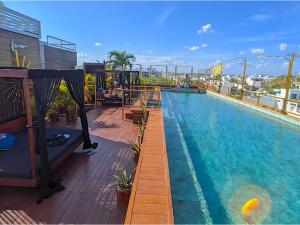 Departamento en venta en Quintas del Carmen, Solidaridad — foto 3 de 45