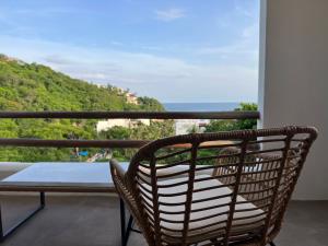 Departamento en venta en Zona Hotelera Tangolunda, Santa María Huatulco — foto 2 de 45