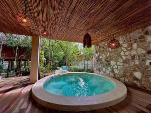 Casa en renta en Francisco Uh May, Tulum — foto 2 de 21