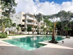 Departamento en venta en Nuevo Centro Urbano, Solidaridad, Quintana Roo — foto 1 de 11