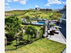 Terreno en venta en Lomas de Angelópolis, San Andrés Cholula — foto 2 de 4