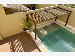 Casa con Alberca en Residencial Allegranza Playa del Carmen · 210 m2 · 4 Recamaras — foto 1 de 22