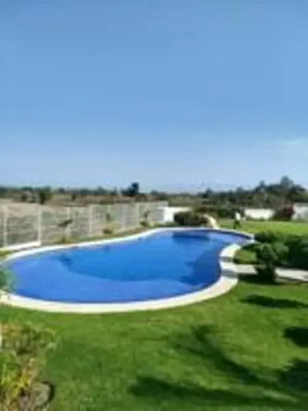 TU HOGAR IDEAL EN CHAPALA, CON RECAMARA EN PLANTA BAJA Y JARDIN .