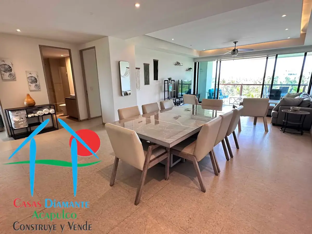 Depa en venta en Playa Diamante. Terraza con vista a las áreas comunes Depa en venta en Playa Diamante. Terraza con vista a las áreas comunes