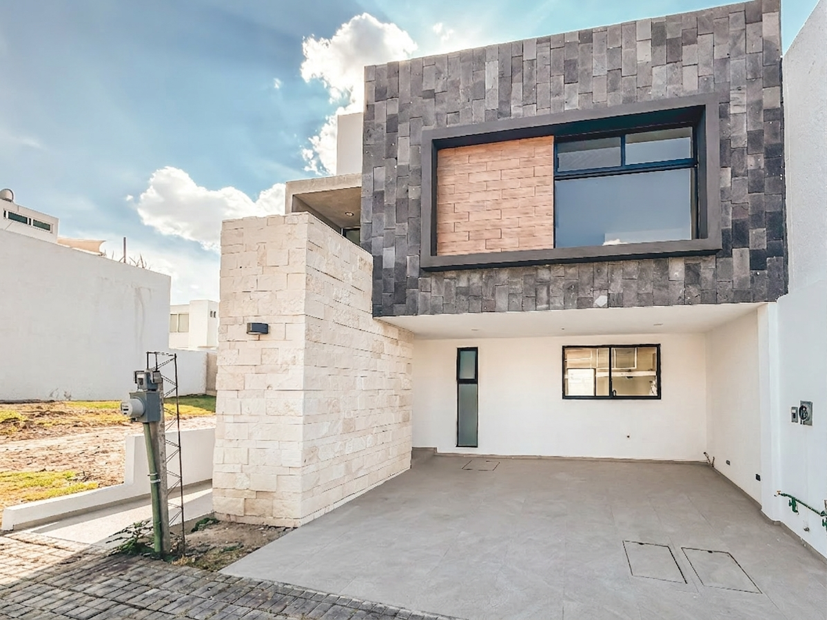 Casa en venta en Lomas de Angelópolis, Ocoyucan — foto 1 de 48