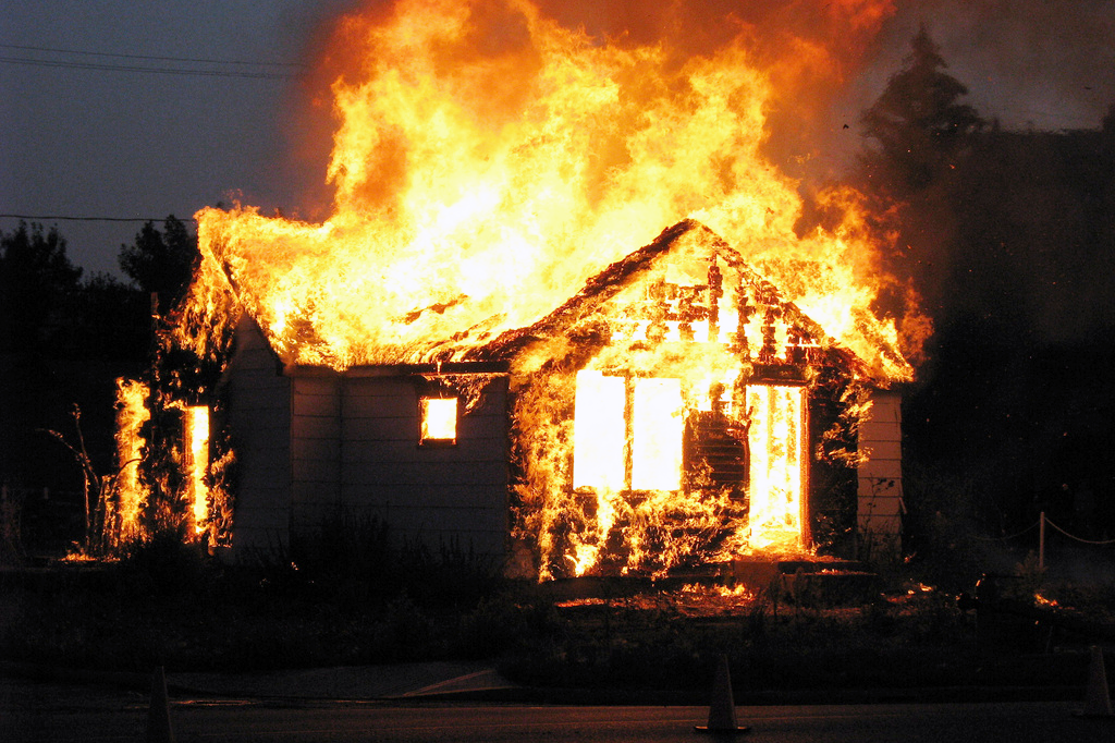 The Burning of Damien's home banner image