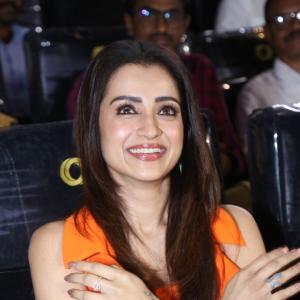 Actress Trisha Krishnan Shines in Orange at Public Event | Latest Photos
