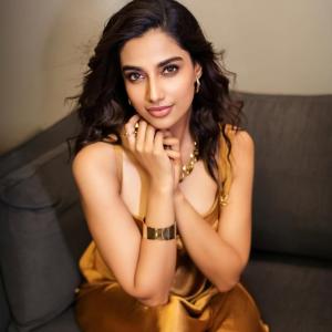 Actress Meenakshi Chaudhary Turns Heads in Golden Gown | Glamorous Look