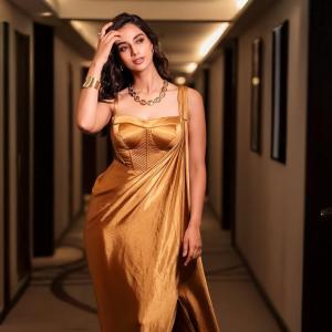 Actress Meenakshi Chaudhary Turns Heads in Golden Gown | Glamorous Look