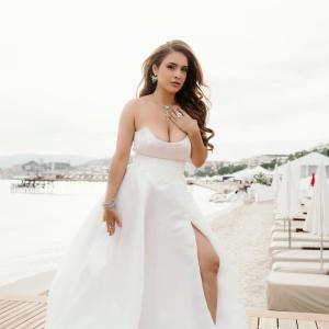 Actress Neha Malik Dazzles in White Gown | Latest Photos