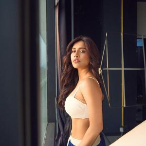 Actress Nabha Natesh Rocks Sporty Chic Look in Crop Top & Track Pants | Latest Photos