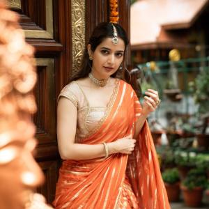 Actress Ashika Ranganath Radiates Grace in Orange Saree | Traditional Look
