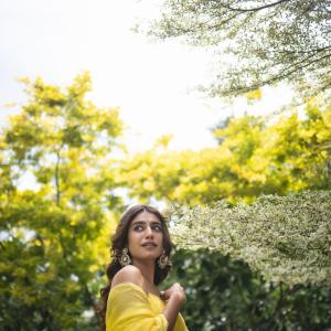 Actress Priya Warrier Radiates Elegance in Yellow Dress – Latest Photos