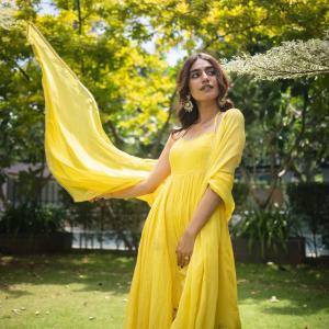 Actress Priya Warrier Radiates Elegance in Yellow Dress – Latest Photos