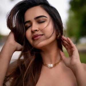 Actress Poojitha Ponnada Latest Photos | Stunning Riverside Look in Off-Shoulder Dress