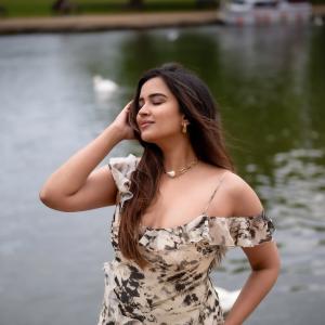 Actress Poojitha Ponnada Latest Photos | Stunning Riverside Look in Off-Shoulder Dress