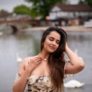 Actress Poojitha Ponnada Latest Photos | Stunning Riverside Look in Off-Shoulder Dress