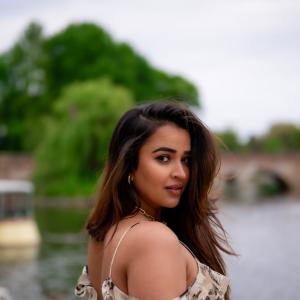 Actress Poojitha Ponnada Latest Photos | Stunning Riverside Look in Off-Shoulder Dress