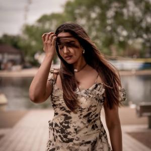 Actress Poojitha Ponnada Latest Photos | Stunning Riverside Look in Off-Shoulder Dress