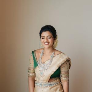 Actress Aishwarya Rajesh Stuns in Traditional Silk Saree Look with Emerald Jewelry