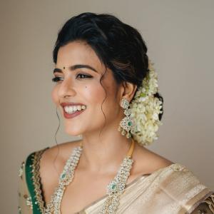 Actress Aishwarya Rajesh Stuns in Traditional Silk Saree Look with Emerald Jewelry