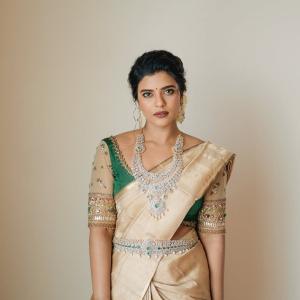 Actress Aishwarya Rajesh Stuns in Traditional Silk Saree Look with Emerald Jewelry