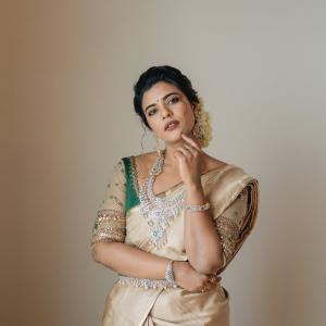 Actress Aishwarya Rajesh Stuns in Traditional Silk Saree Look with Emerald Jewelry
