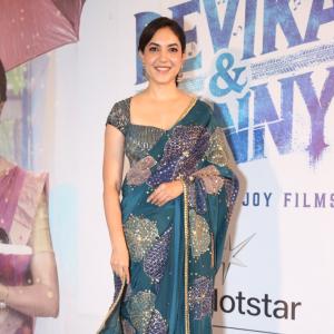 Ritu Varma Looks Elegant in Teal Embroidered Saree at Red Carpet Event