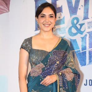 Ritu Varma Looks Elegant in Teal Embroidered Saree at Red Carpet Event