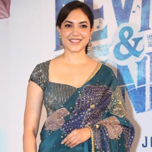 Ritu Varma Looks Elegant in Teal Embroidered Saree at Red Carpet Event