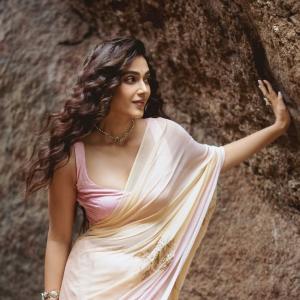 Actress Aakanksha Singh Radiates Elegance in Pastel Saree with Floral Charm