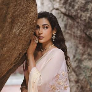 Actress Aakanksha Singh Radiates Elegance in Pastel Saree with Floral Charm