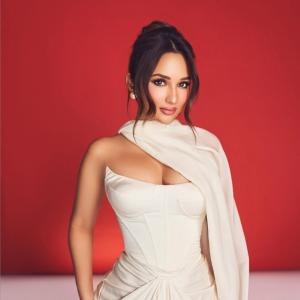 Actress Aakanksha Sharma Looks Stunning in Off-White Draped Gown