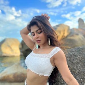Actress Ishwarya Menon Radiates Elegance in All-White Beach Look | Summer Fashion Vibes