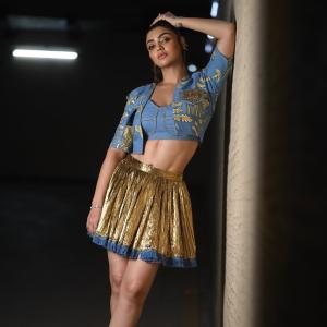 Actress Akanksha Puri Shines in Gold Pleated Skirt – Stunning Fusion Look